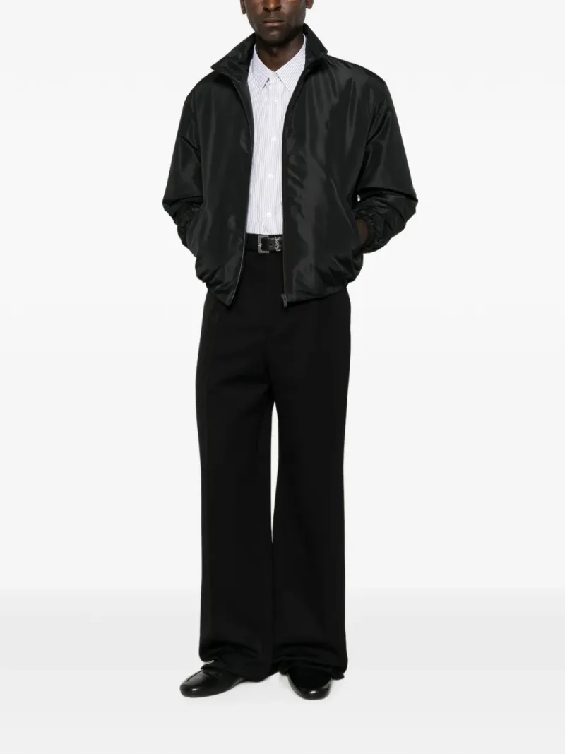Saint Laurent — Pressed-crease wide-leg trousers — Photo 2 of 4