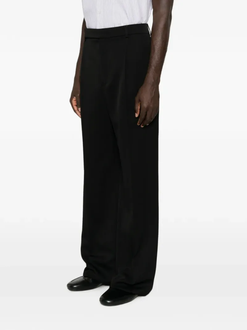 Saint Laurent — Pressed-crease wide-leg trousers — Photo 3 of 4